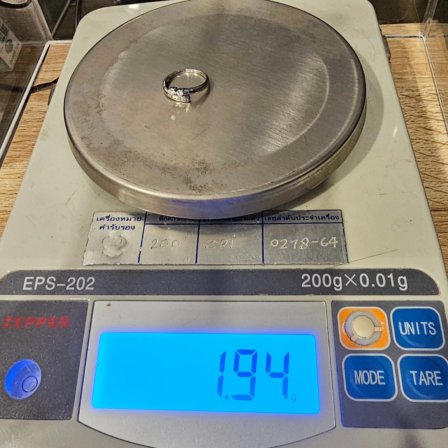 🚫ปิดการขาย(SoIdOut)🚫 แหวนทองคำขาว 18K เพชรเกสร 7 ตัง 2 เม็ด 1 ตัง 6 เม็ด รวม 20 ตัง น้ำ 96-97 ความสะอาด Si2 ไซส์ 49 น้ำหนัก 1.94 กรัม ราคา 4600.-(Net)