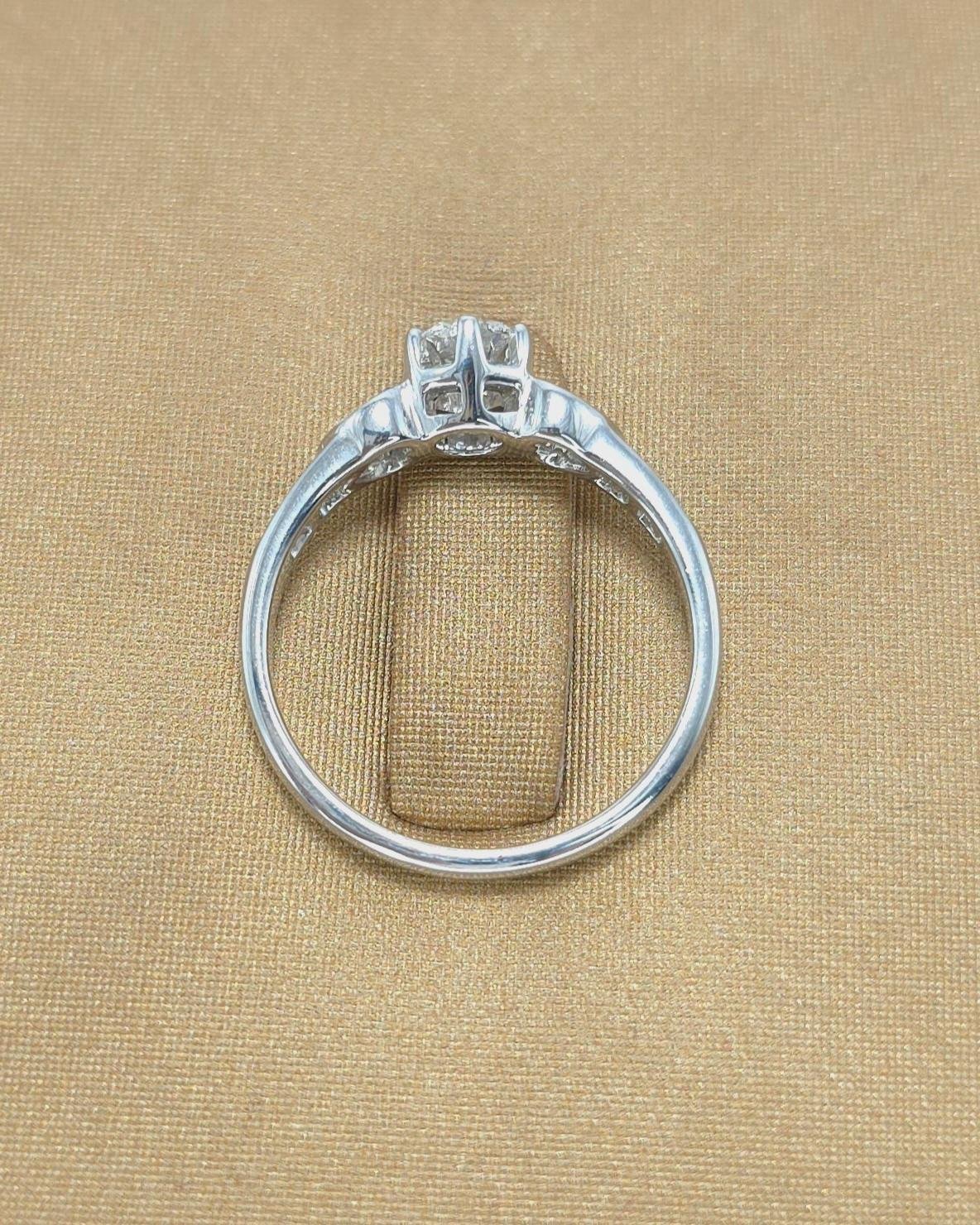 🚫ปิดการขาย(SoIdOut)🚫แหวนทองคำ 18K ชุบสีทองขาว เพชรเกสร 35 ตัง 1 เม็ด น้ำ 98(F) VS1 3 Excellent GIA:5316589899 ใบสำเนา ข้างเพชรเกสร 7 ตัง 2 เม็ด 3 ตัง 4 เม็ด รวม 26 ตัง น้ำ 98-100 ความสะอาด vvs ไซส์ 49 น้ำหนัก 2.47 กรัม ราคา 22,500.-(Net)