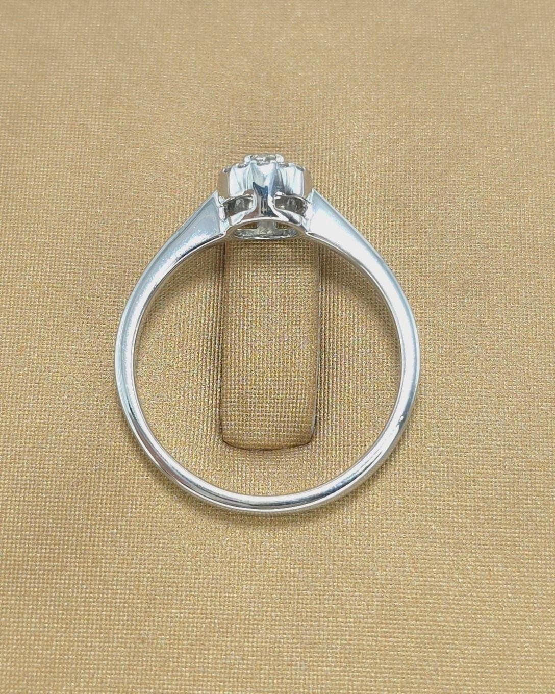 🚫ปิดการขาย(SoIdOut)🚫 แหวนทองคำขาว 18k แบรนด์ Jubilee เพชรเกสร 12 ตัง 1 เม็ด 0.36 ตัง 14 เม็ด รวม 17 ตัง น้ำ 99(E) ความสะอาด if-vvs ไซส์ 57 น้ำหนัก 3.34 กรัม ราคา 10,900.-(Net) (ออกShop29,900ประหยัดเกือบ65%)