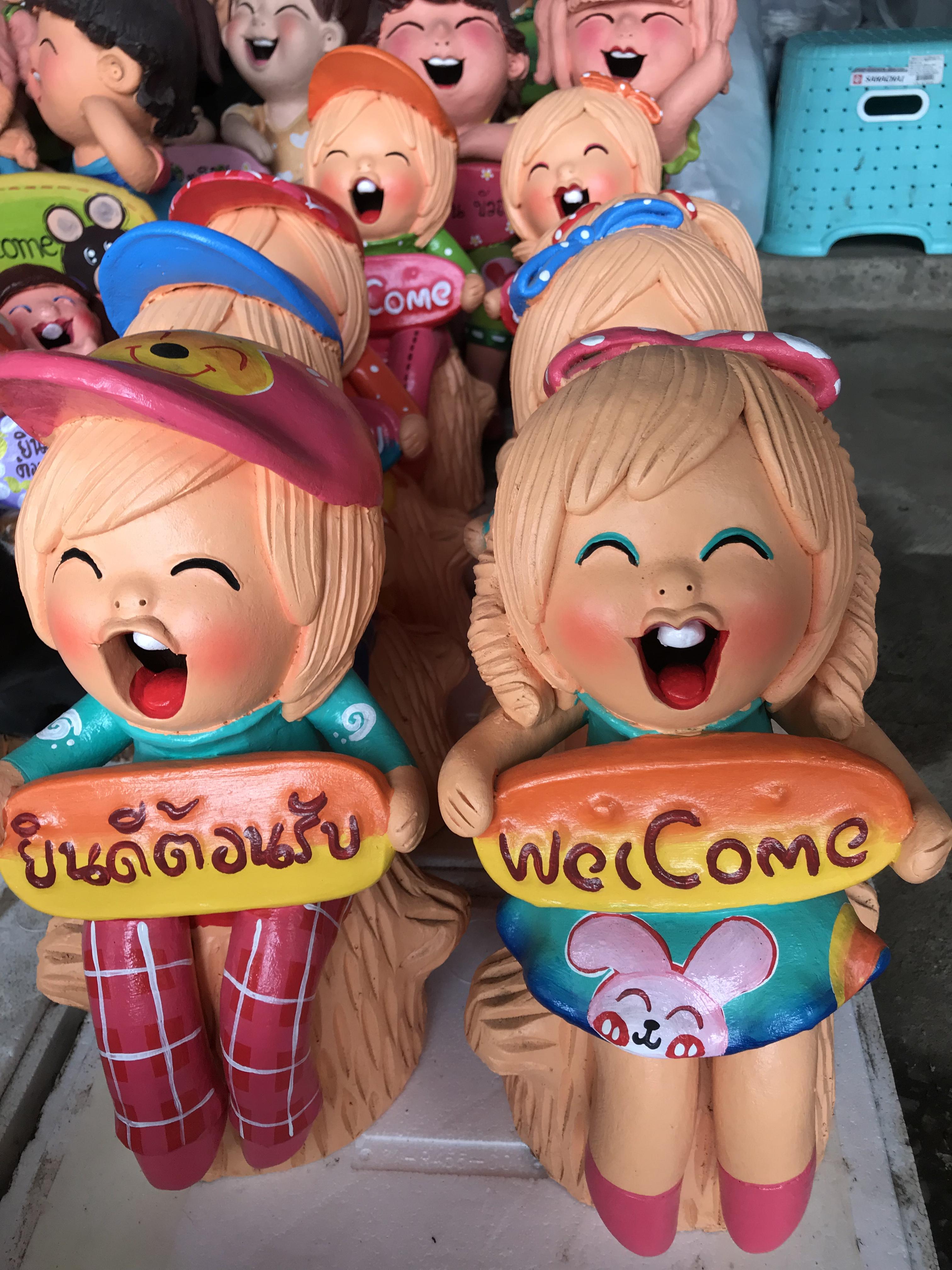 ตุ๊กตาคู่ดินเผานั่งตอกลาง