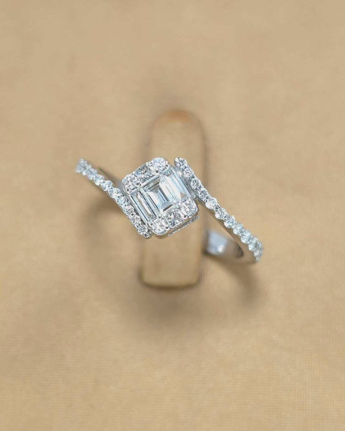 🚫ปิดการขาย(SoIdOut)🚫แหวนทองคำขาว 18K เพชร Baguette 13 ตัง 1 เม็ด 6 ตัง 2 เม็ด เพชร Princess 2 ตัง 2 เม็ด เพชรเกสร 1.75 ตัง 4 เม็ด 1.5 ตัง 2 เม็ด 1 ตัง 6 เม็ด 0.5 ตัง 16 เม็ด รวม 53 ตัง น้ำ 96-97 ความสะอาด vvs-vs ไซส์ 54 น้ำหนัก 2.5 กรัม รา