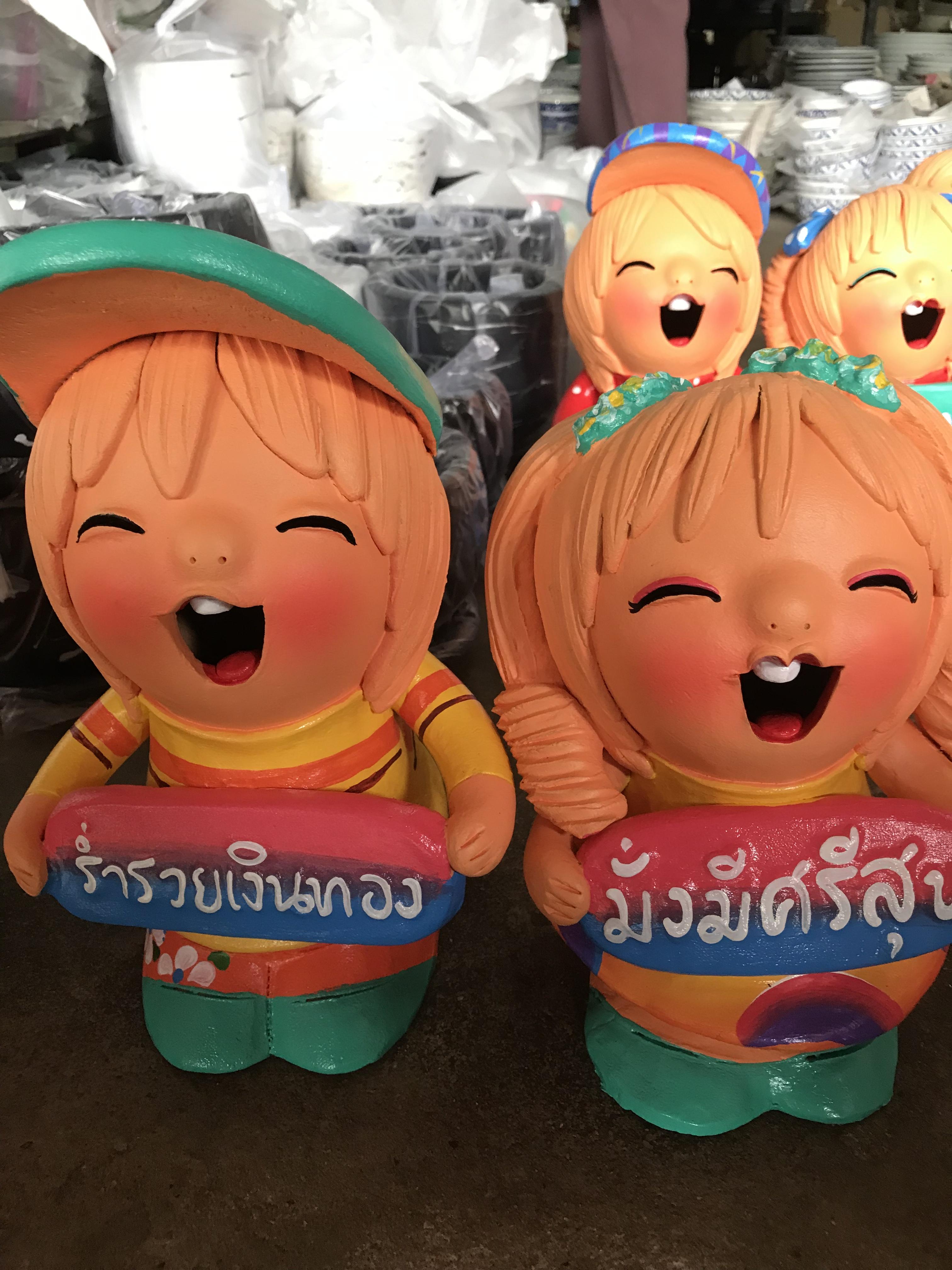 ตุ๊กตาดินเผาคู่เด็กอ้วนใส่หมวก