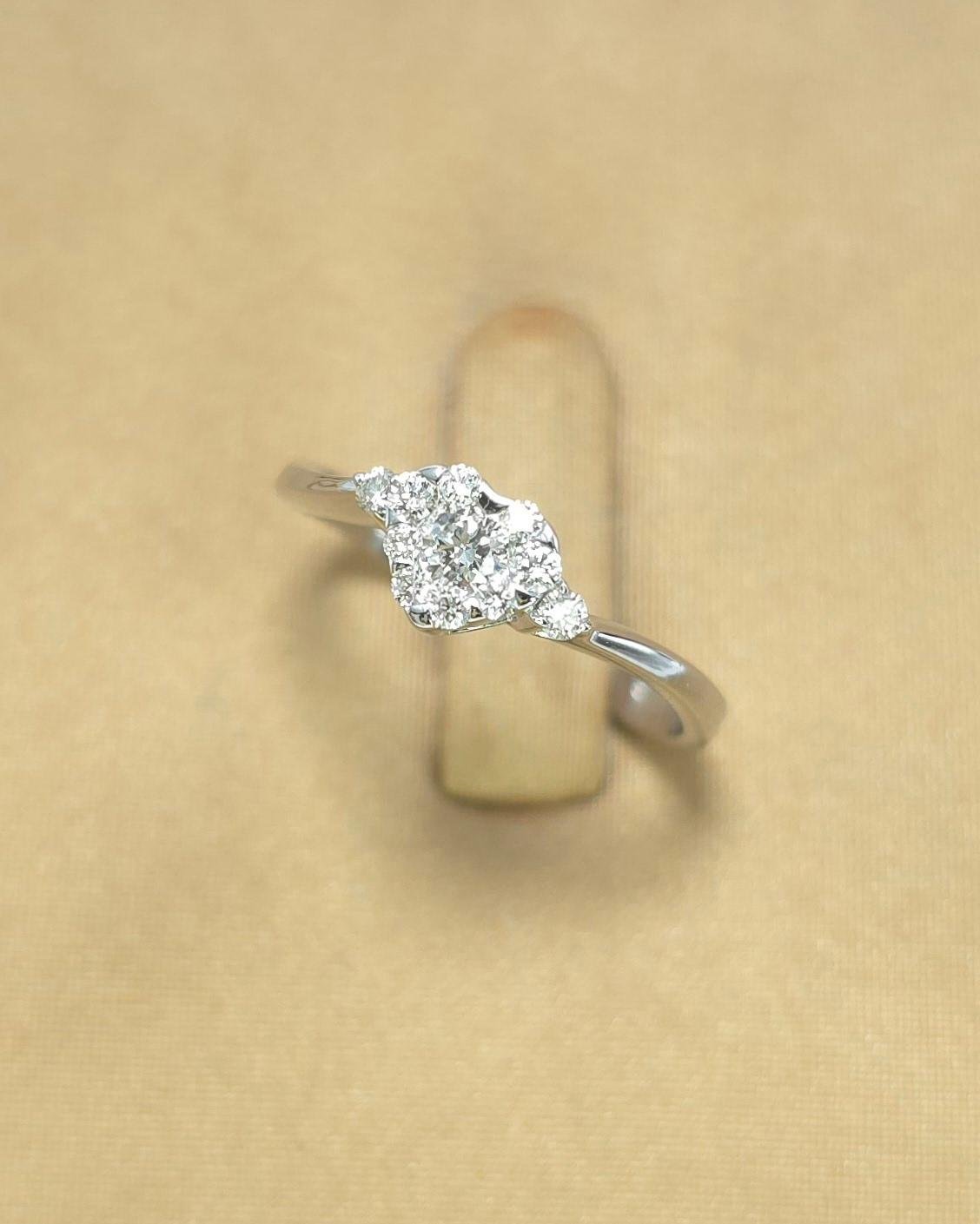 🚫ปิดการขาย(SoIdOut)🚫แหวนทองคำขาว 18K แบรนด์ Dilavie เพชรเกสร 10 ตัง 1 เม็ด 2 ตัง 4 เม็ด 1 ตัง 6 เม็ด รวม 24 ตัง น้ำ 99(E) ความสะอาด vvs ไซส์ 50 น้ำหนัก 1.94 กรัม ราคา 7,900.-(Net)