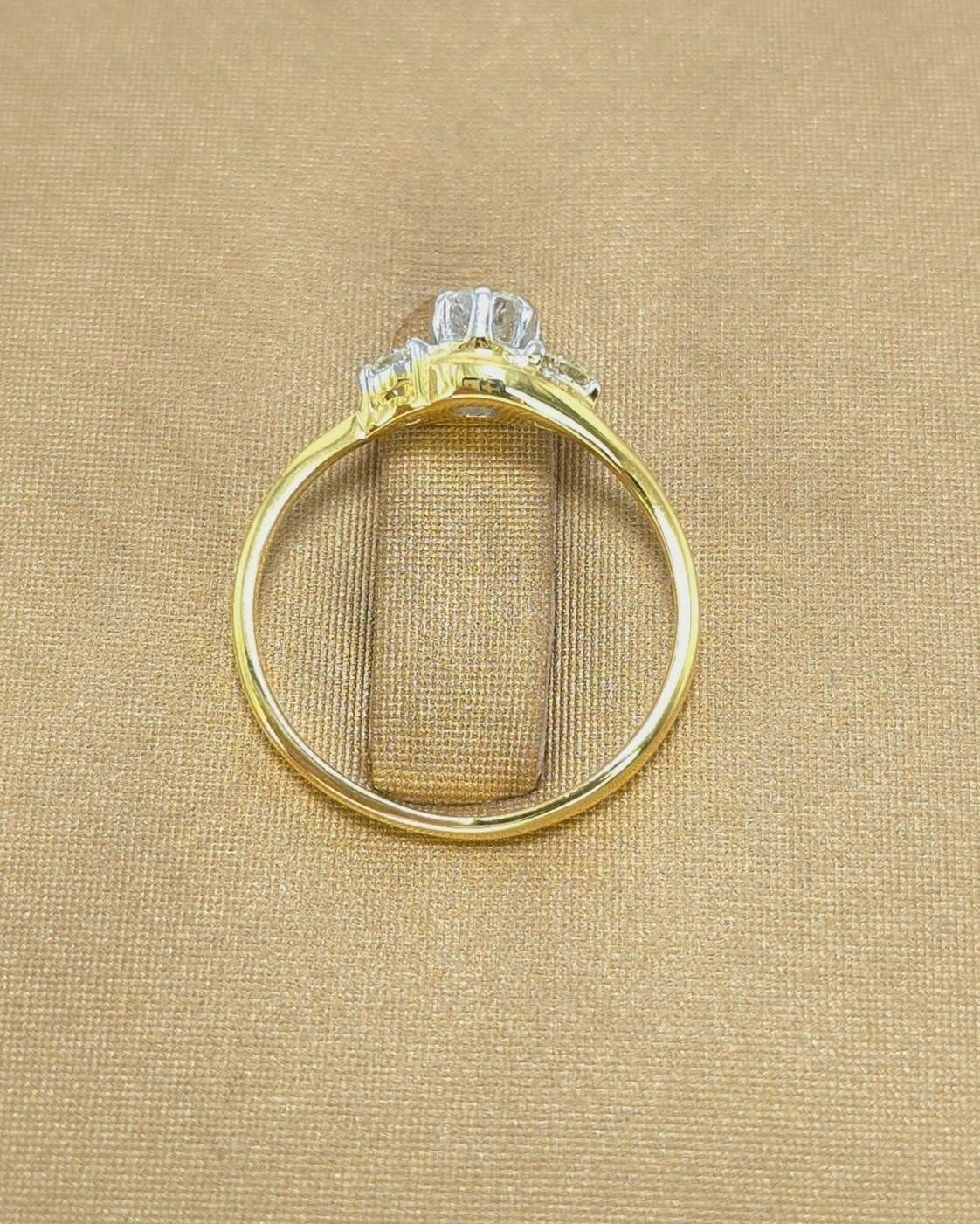 แหวนทองคำ 18K เพชรเกสร 15 ตัง 1 เม็ด 6 ตัง 2 เม็ด รวม 27 ตัง น้ำ 95-96 ความสะอาด vs2 ไซส์ 48 น้ำหนัก 1.64 กรัม ราคา 7,500.-(Net)