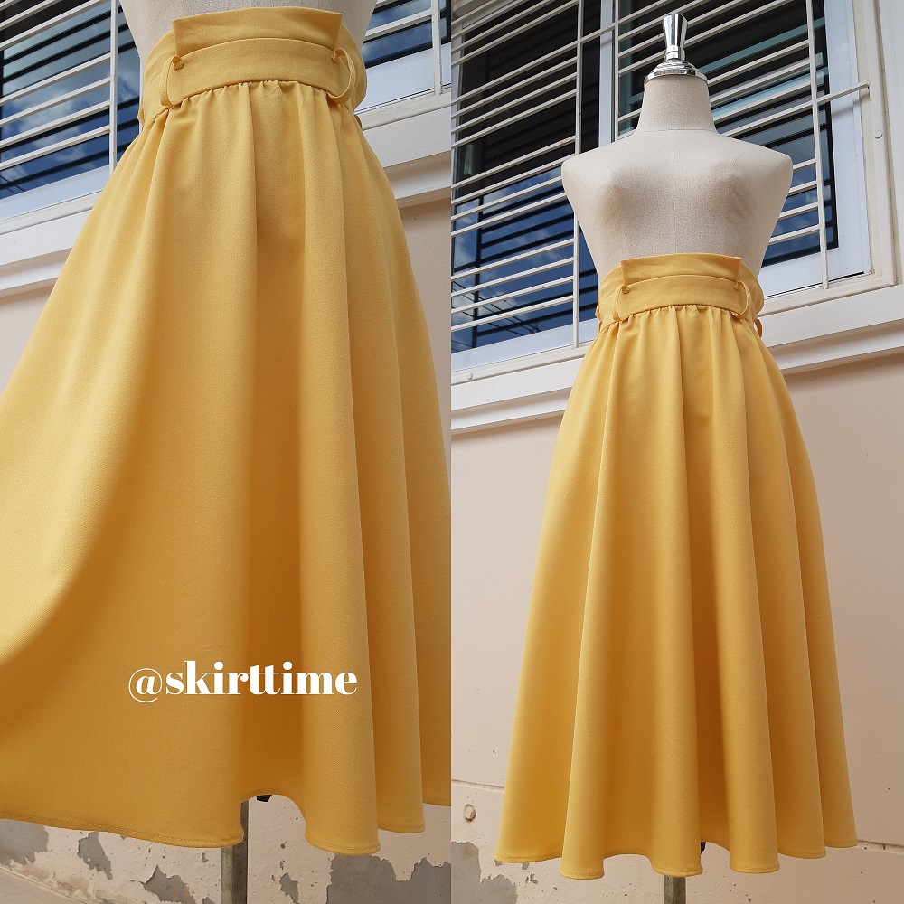 กระโปรงบานเอวสม็อคสีเหลือง