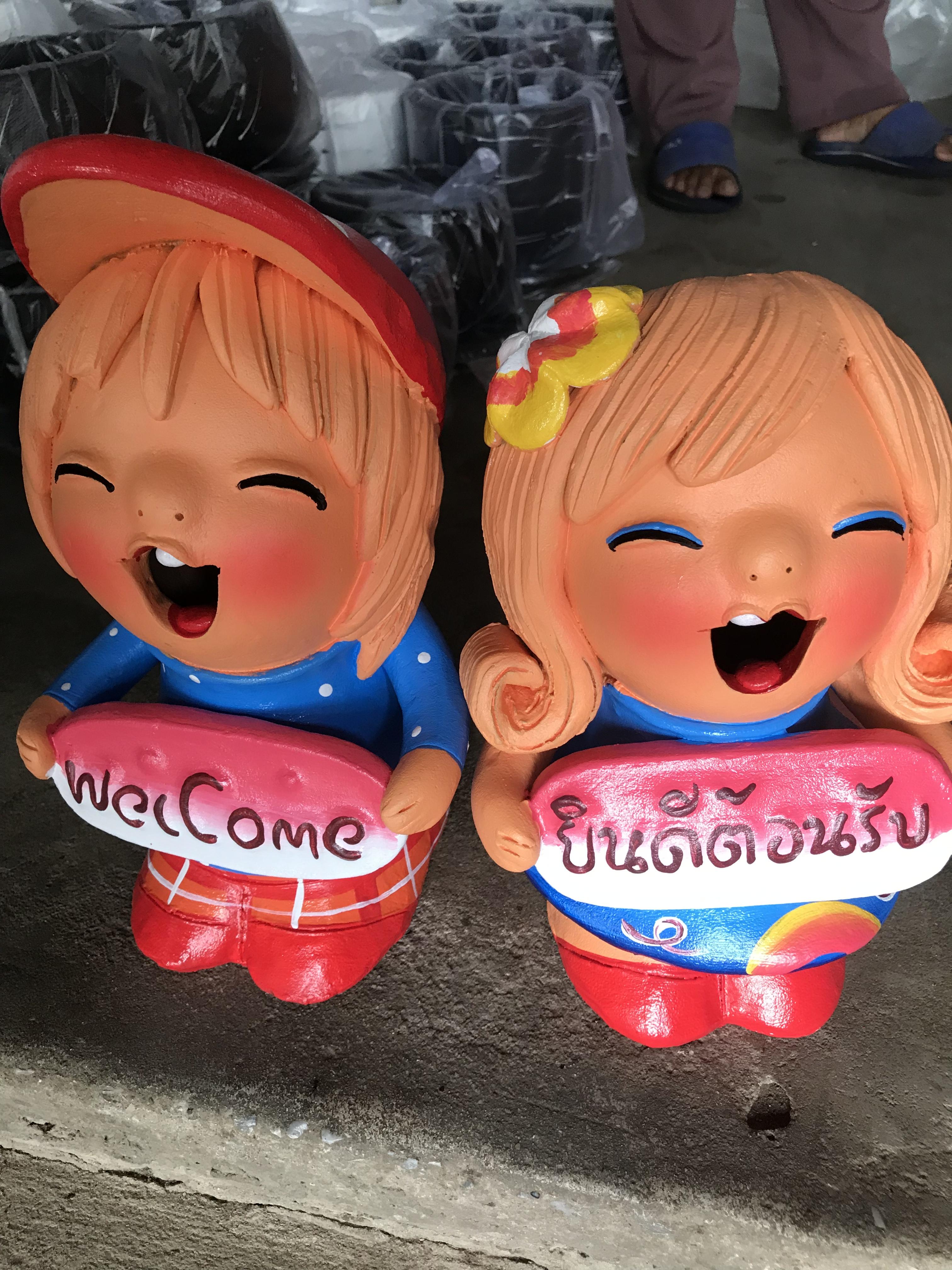 ตุ๊กตาดินเผาคู่เด็กอ้วนใส่หมวก