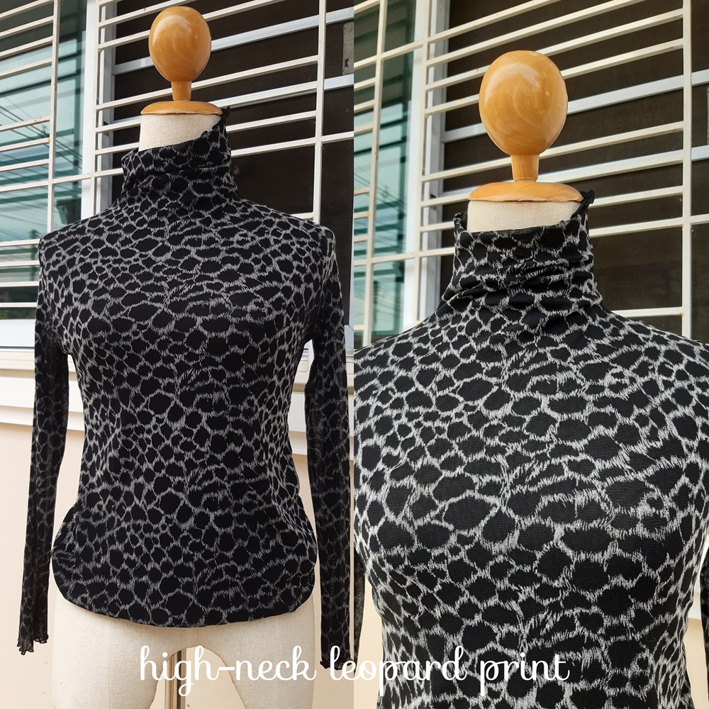 เสื้อผ้ายืดแขนยาวลายเสือสีดำ คอปีน ช่วงแขนเป็นผ้าซีทรู