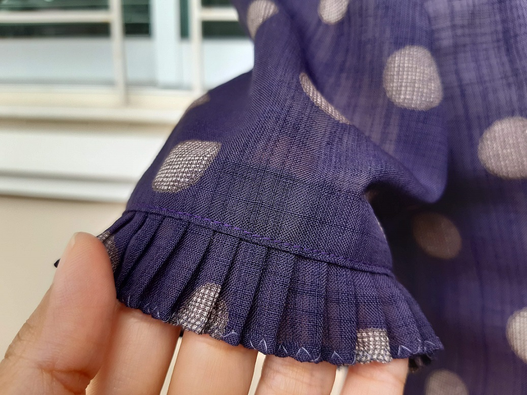 เสื้อวินเทจลายจุดสีม่วงสดใส