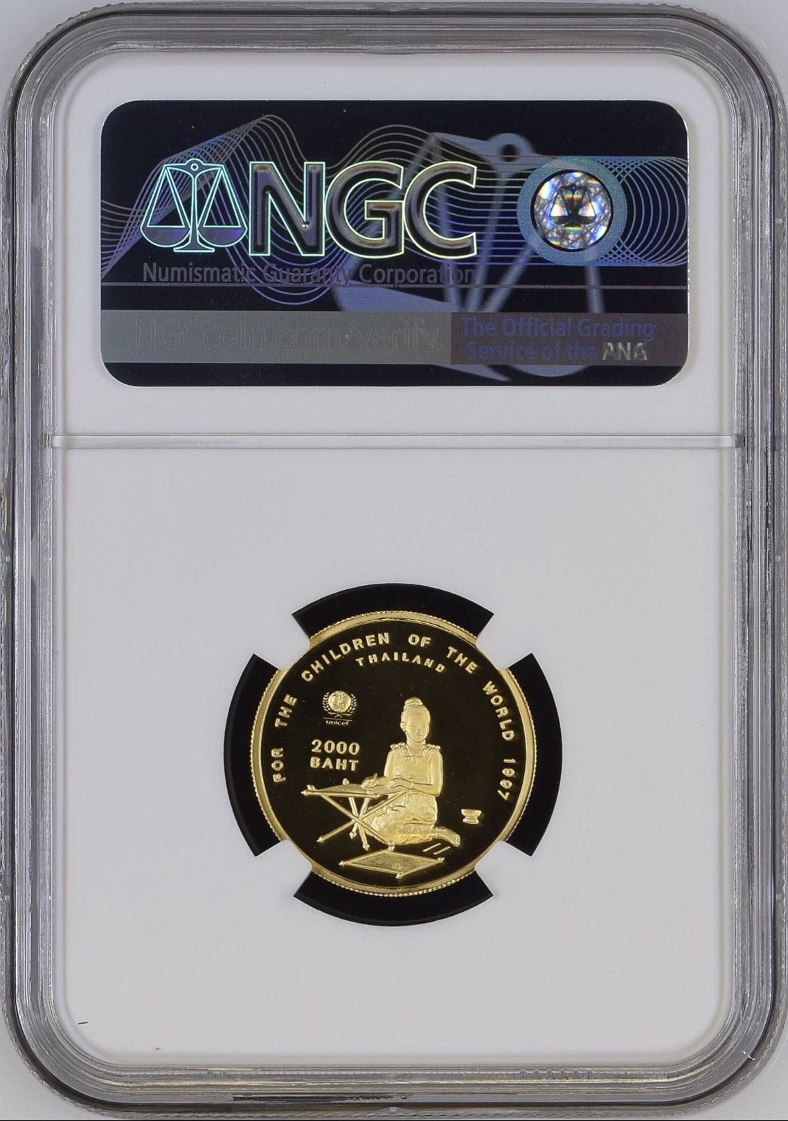 เหรียญทองคำเด็กเขียนกระดาน 50 ปี องค์การทุนเพื่อเด็กแห่งสหประชาชาติ