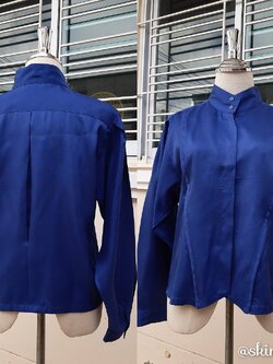 เสื้อเชิ้ตคอปีนสีน้ำเงินสด